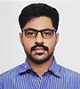 Dr. Thribhuvan R.